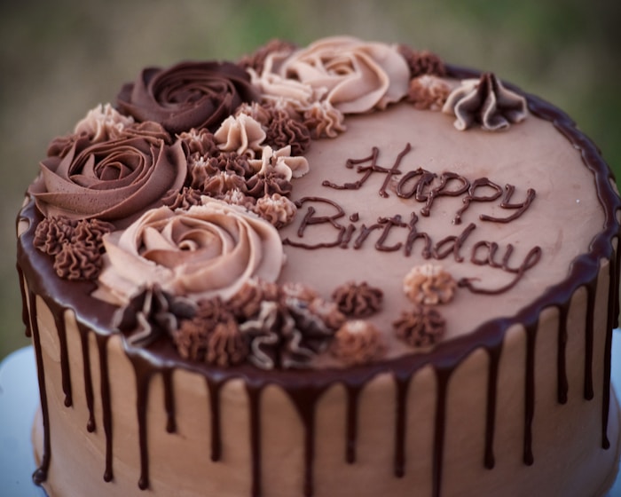 Chocolate birthday cake with piped roses