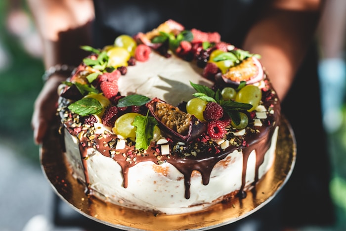 Custom cake topped with fresh fruit