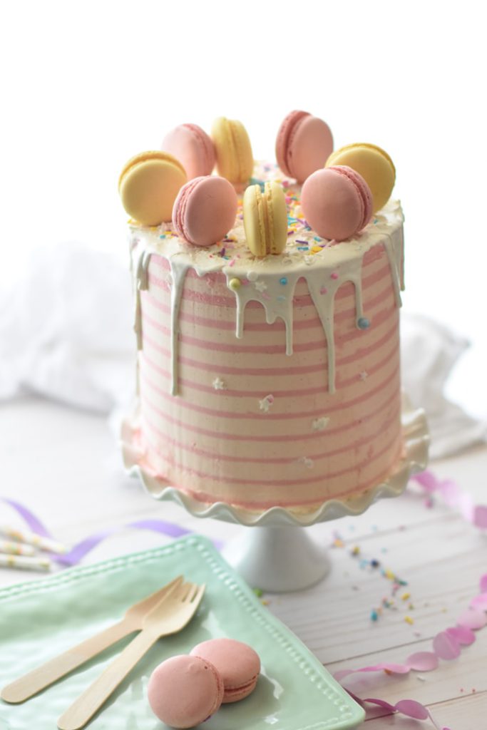 Custom fondant cake with a macaron crown