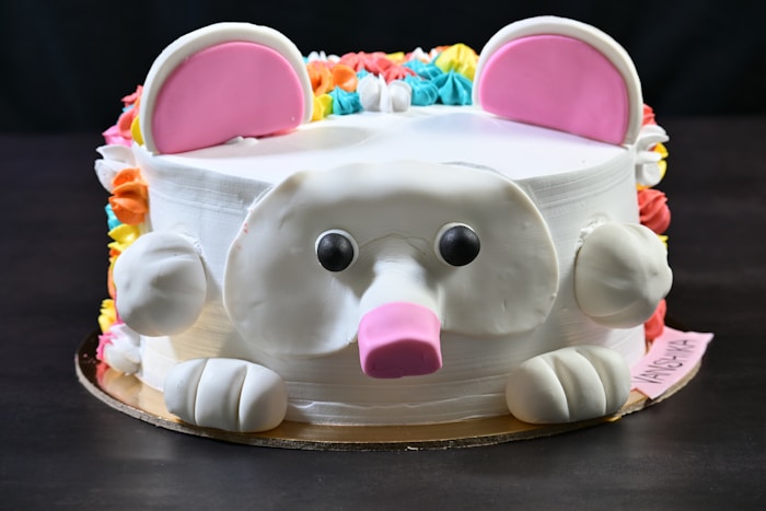 Pink pig character cake